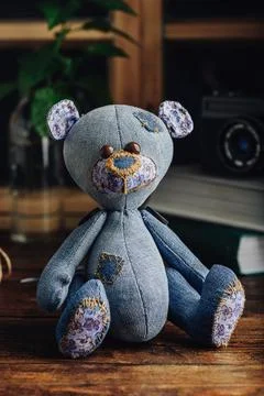 Handmade Bear Sitting on Table Stock Photos