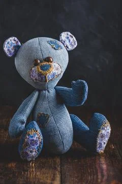 Handmade Bear Sitting on Table Stock Photos