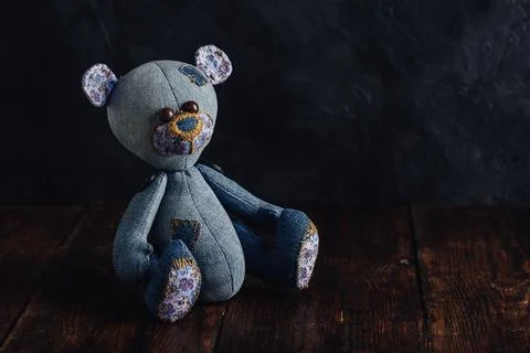Handmade Bear Sitting on Table Stock Photos