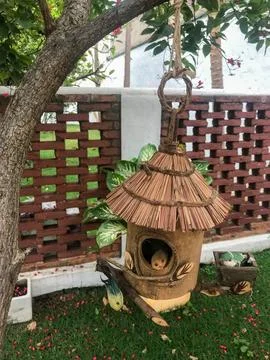 Handmade birdhouse on the tree Stock Photos