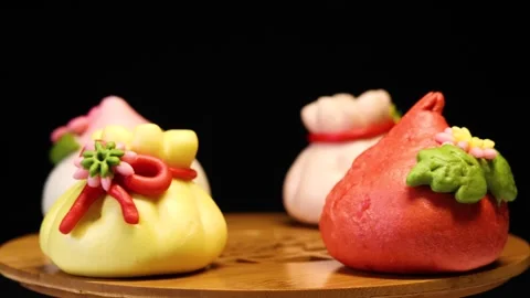 Handmade birthday longevity flower-shaped steamed buns 库存影片 344349323