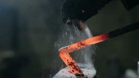 Handmade Blacksmithing in a Workshop. Blacksmith Forging Red-hot Blade of Knife Video stock 143152404