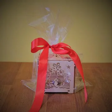 Handmade box wrapped with red bow for Christmas gift Stock Photos