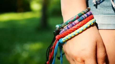 Handmade bracelets on the hand Stock Footage 90462663