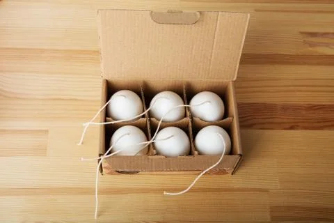 Handmade candles in the shape of eggs Stock Photos