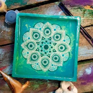 Handmade candlestick with mandala Stock Photos