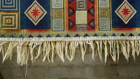 Handmade carpet with geometric patterns Stock Footage 163374890