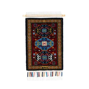 Handmade carpet o a white background Stock Photos