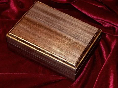 Handmade caskets of solid walnut wood Stock Photos
