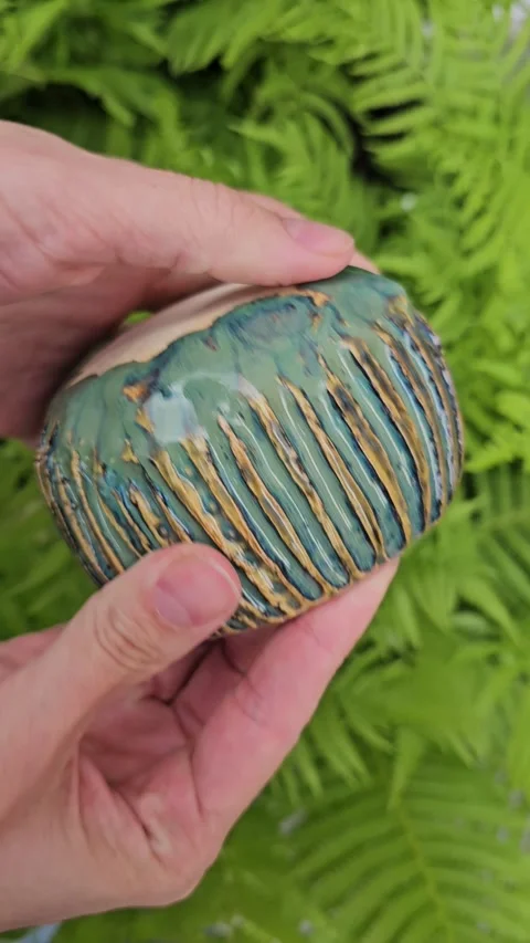 Handmade Ceramic Bowl Rotated in Hands Video stock 324594997