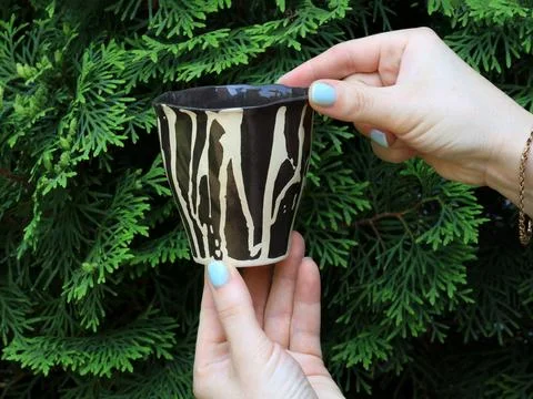 Handmade Ceramic Cup Held in Hands Outdoors Stock Photos