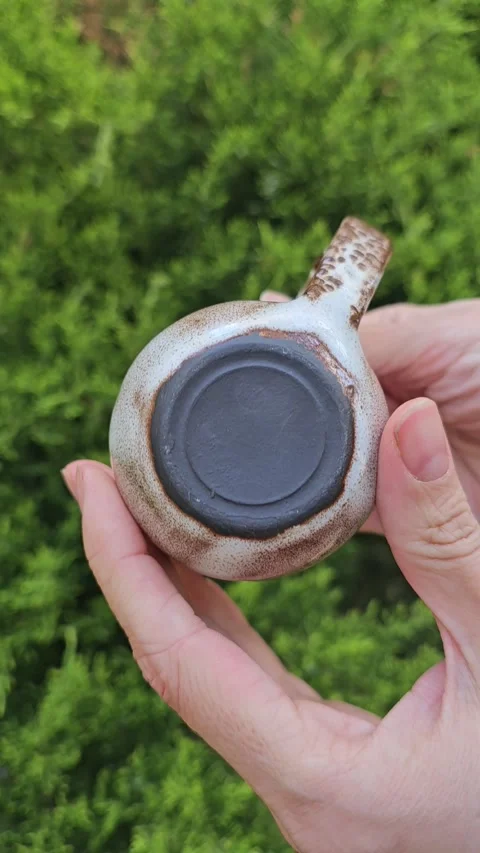 Handmade Ceramic Mug With Brown Glaze Video stock 324715349
