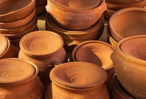 Handmade ceramic new empty craft ceramic plates, bowls and lids. Pottery Craf Stock Photos