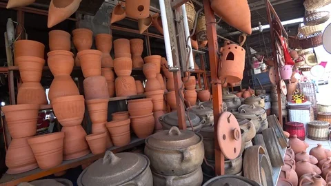 Handmade ceramic pots on shelf Stock Footage 85673864