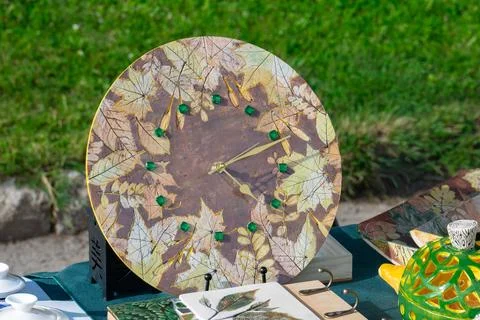 Handmade Ceramic Wall Clock with Botanical Leaf Design Stock Photos