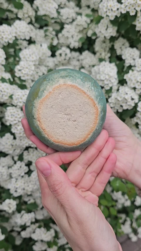 Handmade Chamotte Ceramic Vase With Small Handles Rotating Video stock 324531869