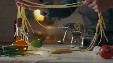 Handmade, chef baker prepares In authentic pasta workshop. Close-up of a mal Stock Footage 245284444