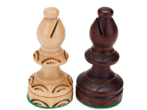Handmade chess bishops on white background Stock Photos