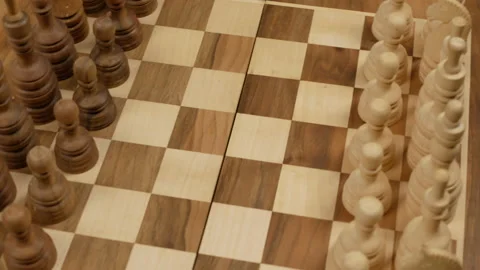 Handmade chess figures on a chess board Stock Footage 150556910