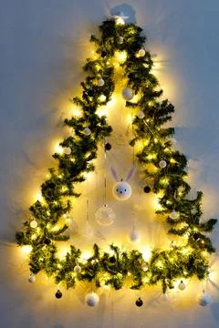 Handmade christmas ball with ears in form of bunny hanging on the christmas.. Foto stock