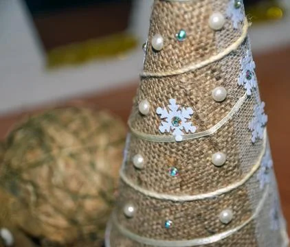 Handmade Christmas tree ornament with rustic texture Stock Photos