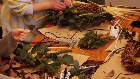 Handmade Christmas wreath composition creation during holidays Stock Footage 263121649