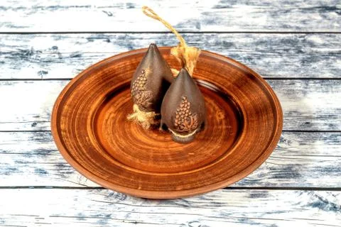 Handmade clay jugs with grape pattern with ropes attached on cl Stock Illustration