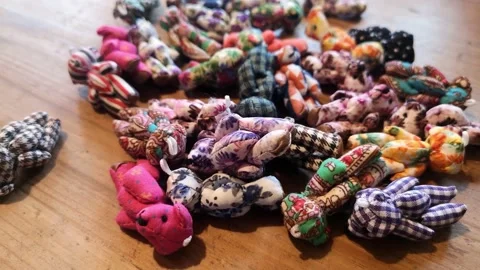 Handmade colourful unique crafted adorable miniature patterned toy teddy Stock Footage 176359740