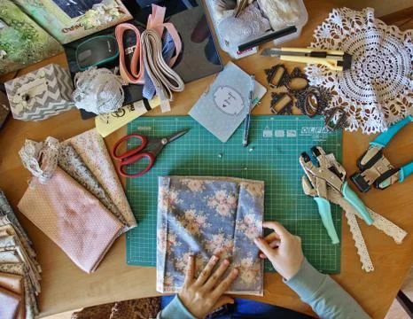Handmade creating of the diary from special scrapbooking paper Stock Photos