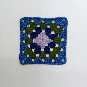 Handmade crochet pattern textile piece Stock Photos