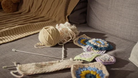 Handmade Crochet Squares with Knitting Needles Resting Indoors Video stock 344558627