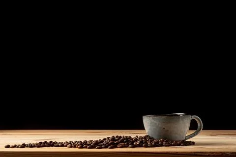 Handmade cup with coffee on the table Foto stock