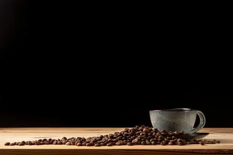 Handmade cup with coffee on the table Stock Photos