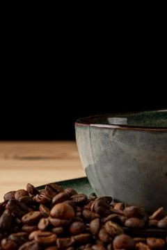 Handmade cup with coffee on the table Stock Photos