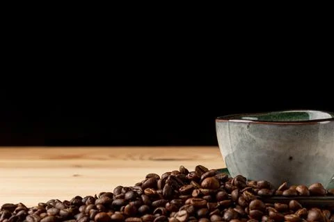 Handmade cup with coffee on the table Stock Photos