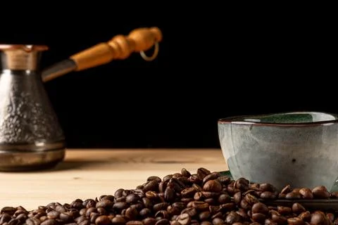 Handmade cup with coffee on the table Foto stock