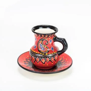 Handmade cup of tea on a white background. Stock Photos
