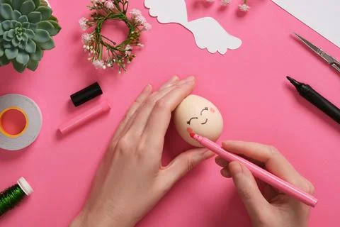 Handmade decoration Easter egg Angel. Step by step instructions. Step 4: Dr.. Stock Photos
