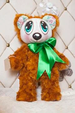 Handmade doll in the interior. Stock Photos