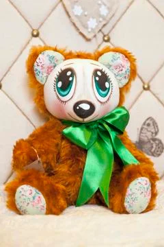 Handmade doll in the interior. Stock Photos