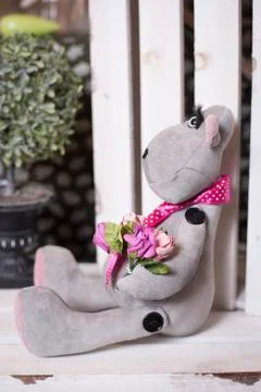 Handmade doll in the interior. Stock Photos