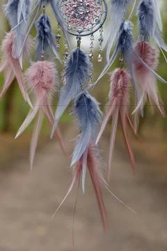 Handmade dream catcher with feathers threads and beads rope hanging Stock Photos
