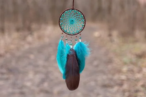 Handmade dream catcher with feathers threads and beads rope hanging Stock-Fotos