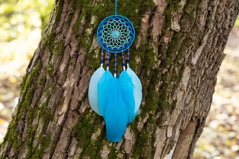 Handmade dream catcher with feathers threads and beads rope hanging Stock Photos