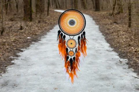 Handmade dream catcher with feathers threads and beads rope hanging Stock Photos