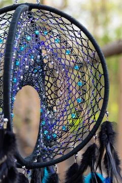 Handmade dream catcher with feathers threads and beads rope hanging Stock Photos