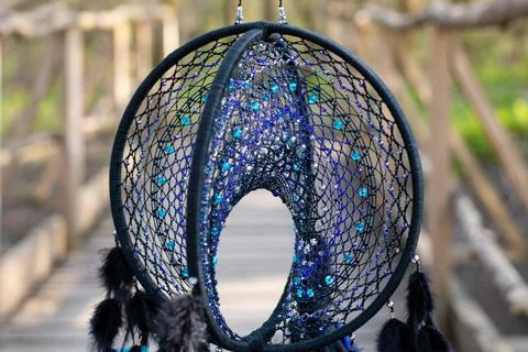 Handmade dream catcher with feathers threads and beads rope hanging Foto stock