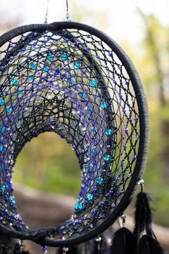 Handmade dream catcher with feathers threads and beads rope hanging Foto stock