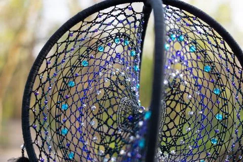 Handmade dream catcher with feathers threads and beads rope hanging Stock Photos