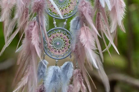 Handmade dream catcher with feathers threads and beads rope hanging Stock Photos